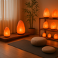 pink salt lamp display in yoga meditation